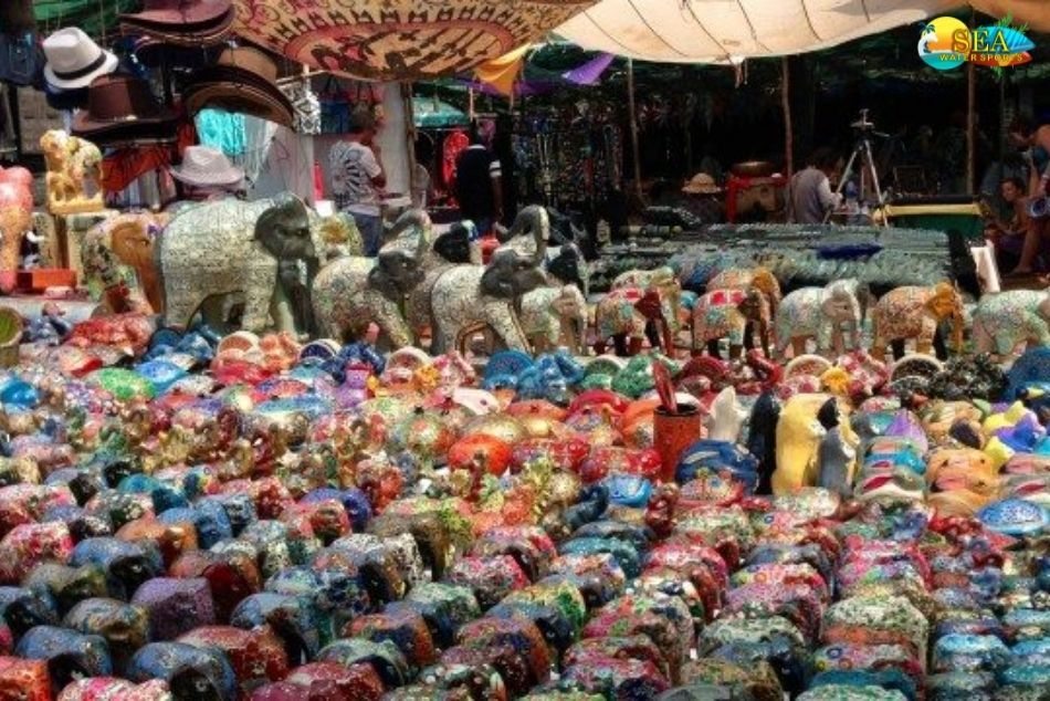 Colorful handcrafted elephant souvenirs displayed at Anjuna Flea Market, Goa, highlighting budget-friendly shopping options for travelers