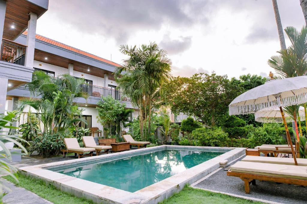 Budget-friendly hotel villa in Bali with a pool and lush greenery for relaxing stays