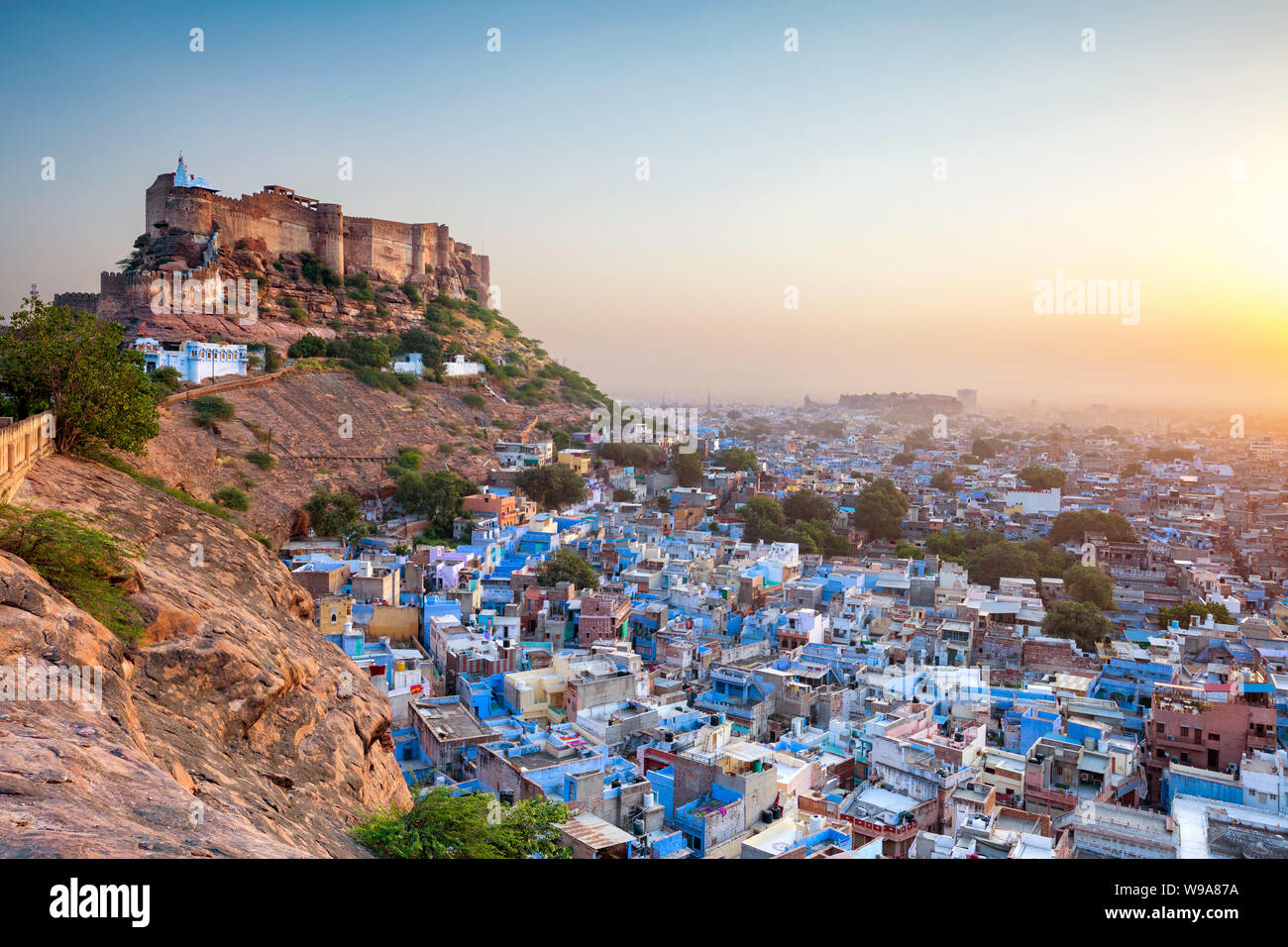 View of Jodhpur's blue houses with Mehrangarh Fort overlooking the city, showcasing Rajasthan's cultural heritage