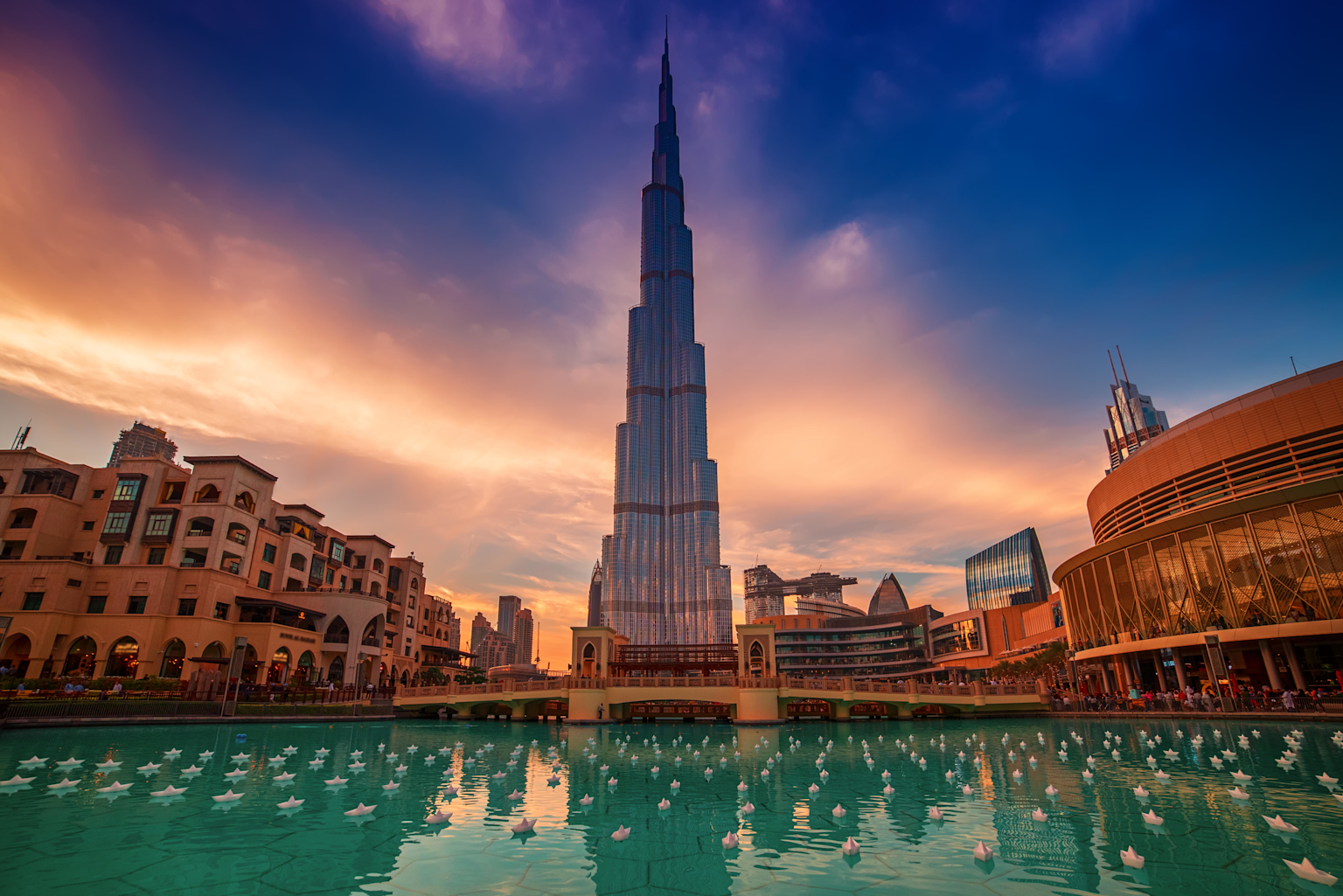 Burj Khalifa at sunset showcasing Dubai's iconic skyline and tourist appeal