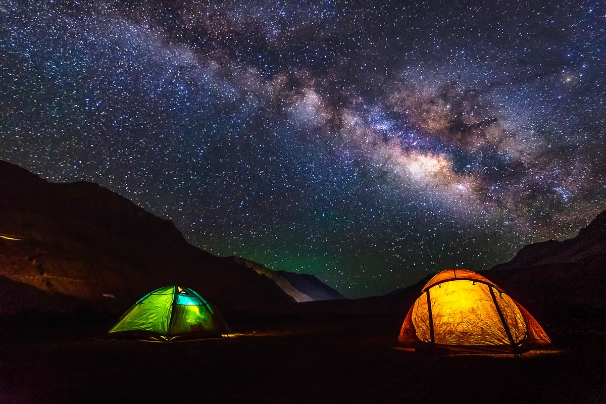 Stargazing and desert camping under the Milky Way in India's remote areas offers a budget-friendly night tourism experience